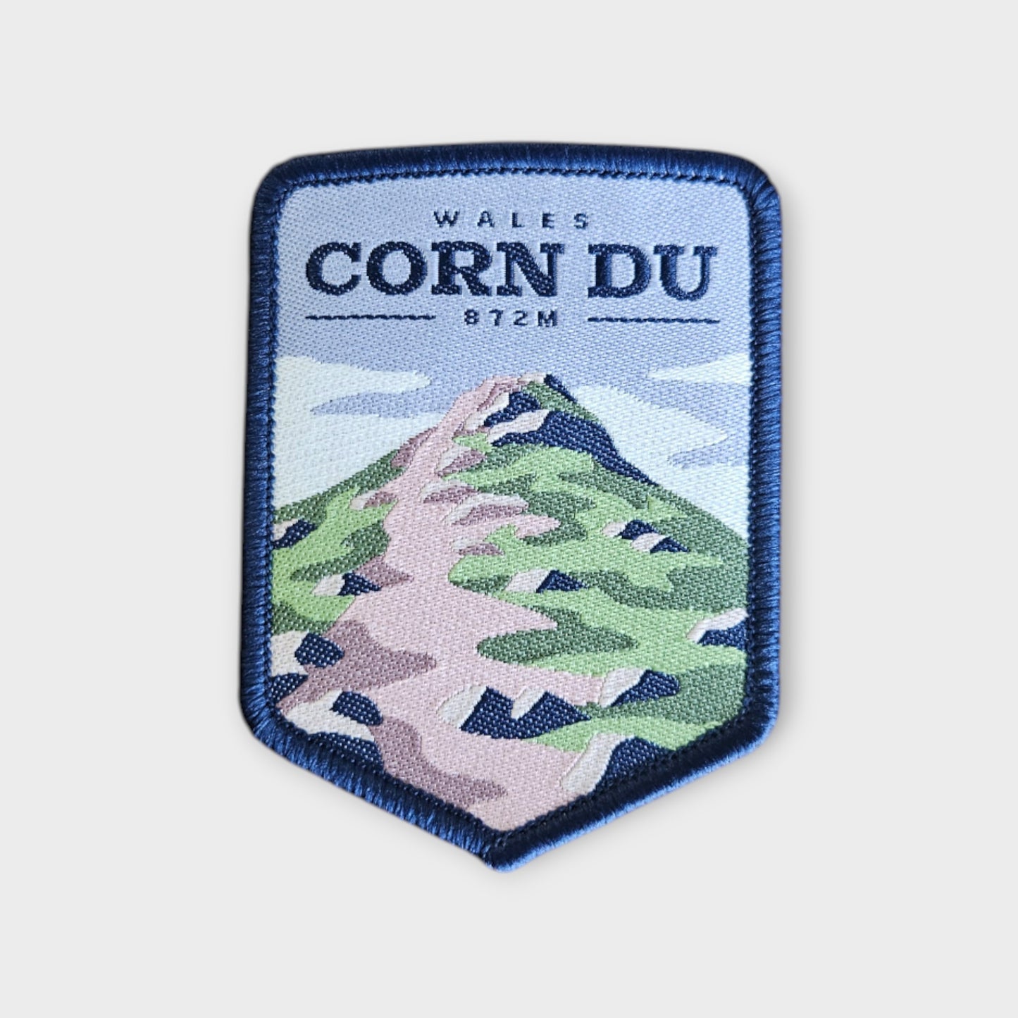 Corn Du depicted on a hiking patch