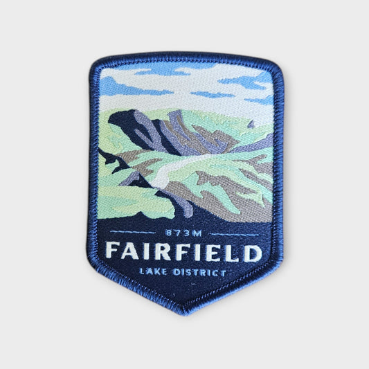 Fairfield depicted on a hiking patch on a grey background