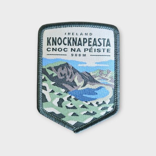 Knocknapeasta depicted on a hiking patch