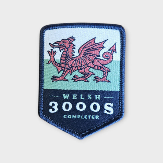 Welsh 3000s depicted on a hiking patch with the welsh flag and dragon