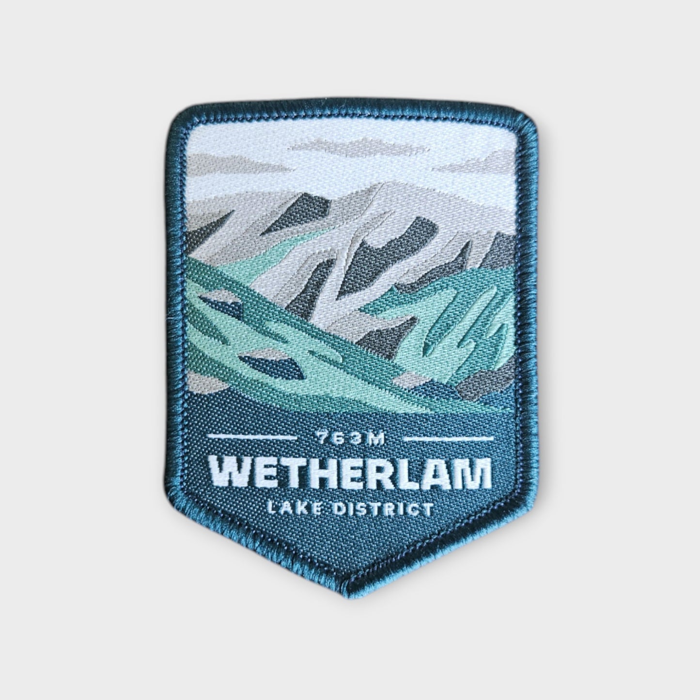 Wetherlam depicted on a hiking patch